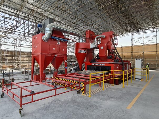 huge depot with hoists and other construction equipment